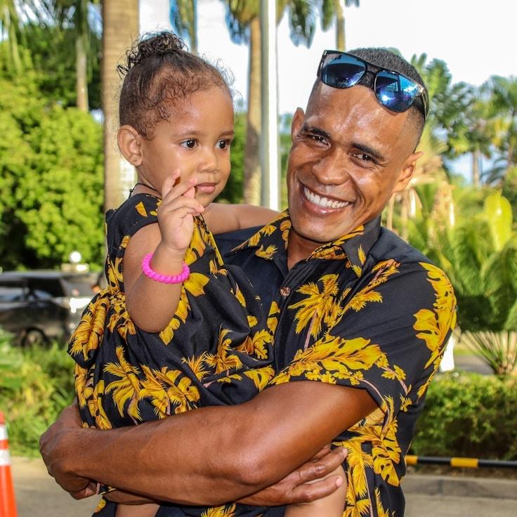 Kaveri Mehta, Lead Design Curator at DriftReedFable, reviewing corporate floral arrangements